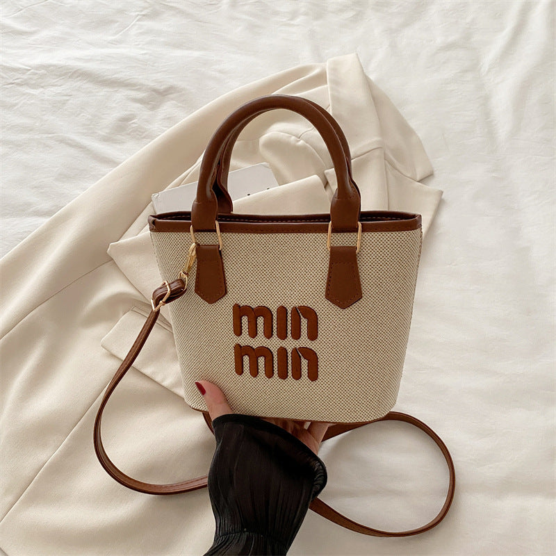Large-capacity hand-held bucket bag