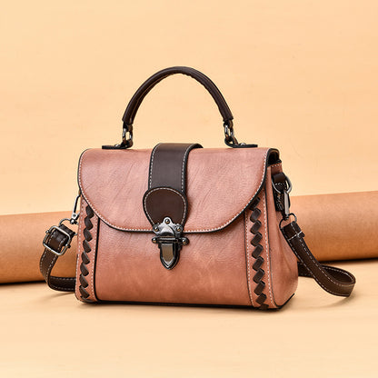 The lady is carrying a crossbody bag.
