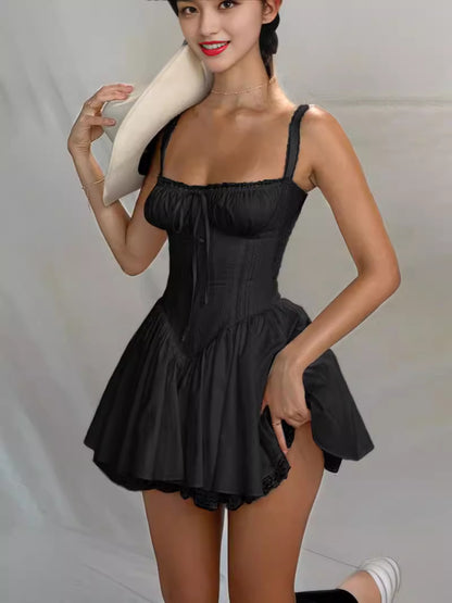 Lace-trimmed slip dress with a cinched waist and open back