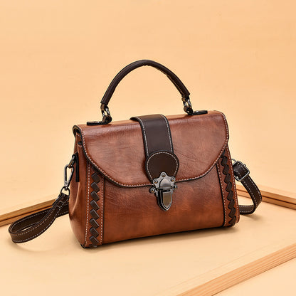 The lady is carrying a crossbody bag.