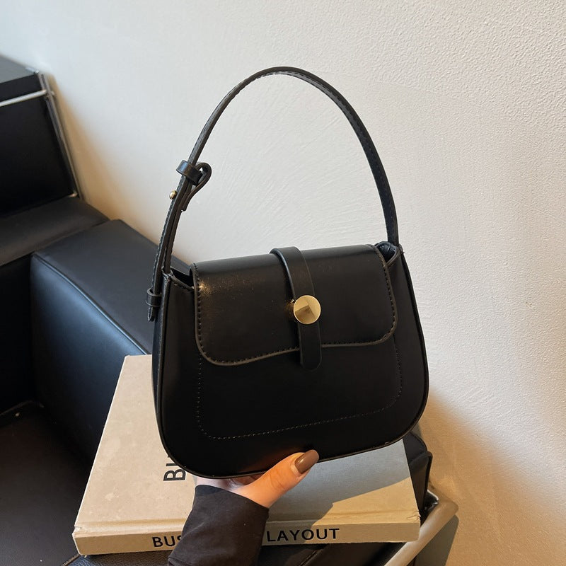 A versatile small square bag