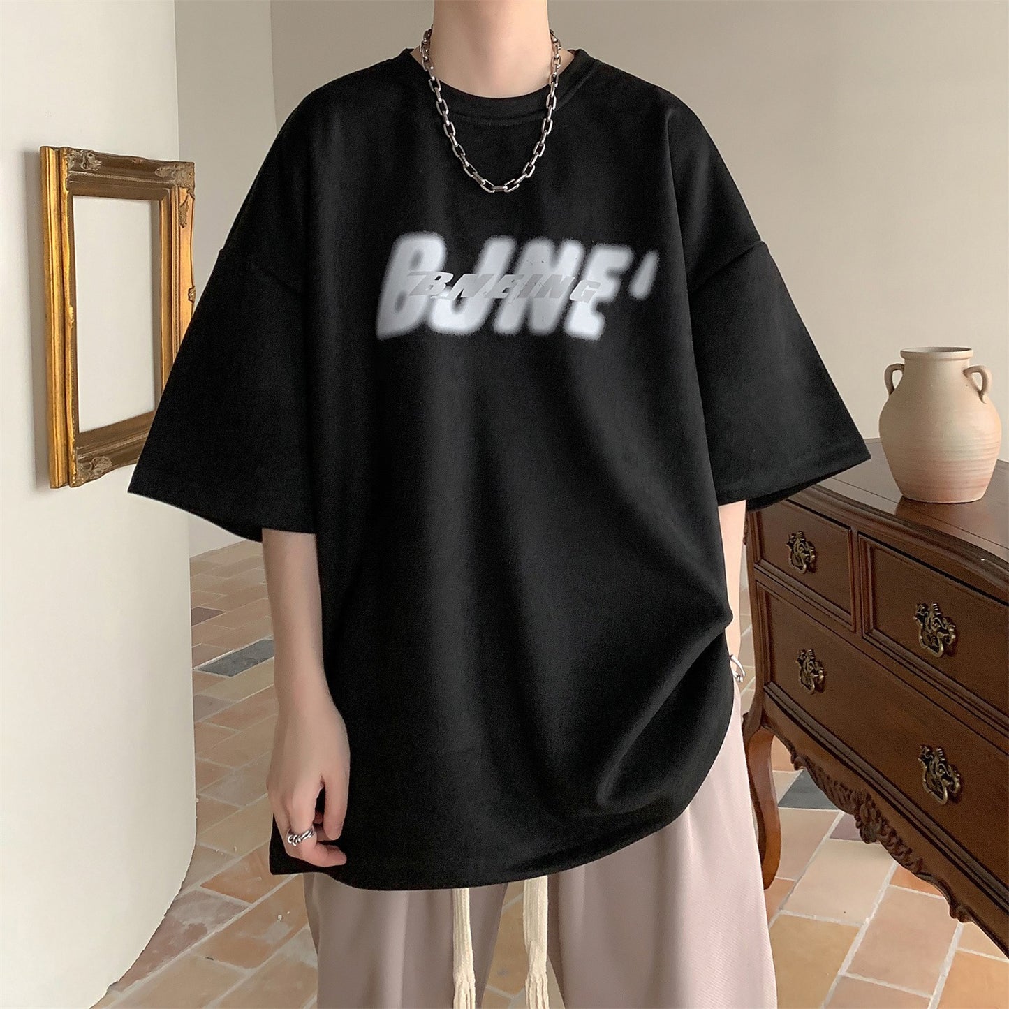 Half sleeve loose short sleeved shirt