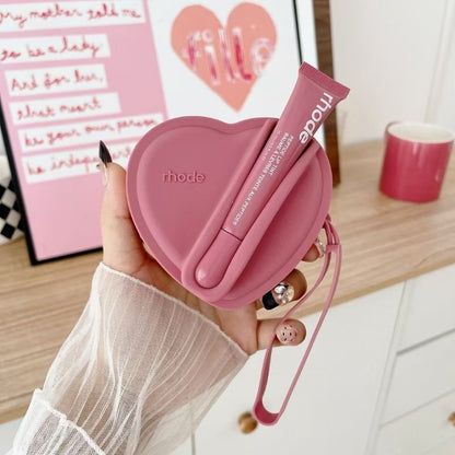 Portable coin purse with earphone compartment
