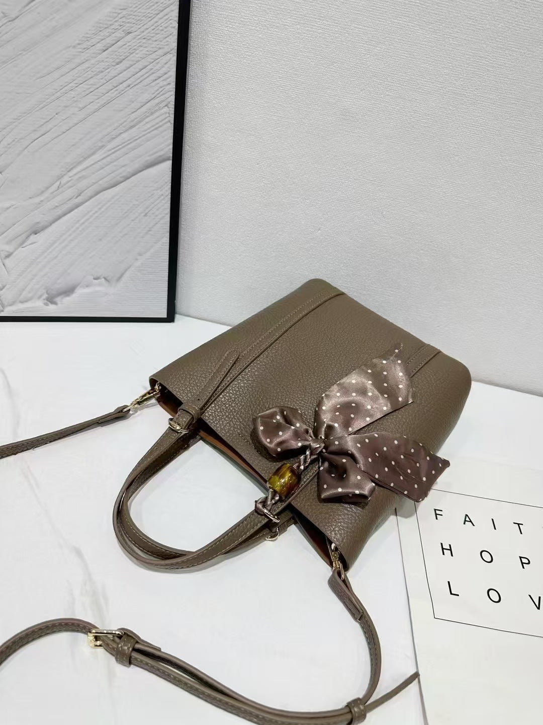 Versatile soft leather bucket bag