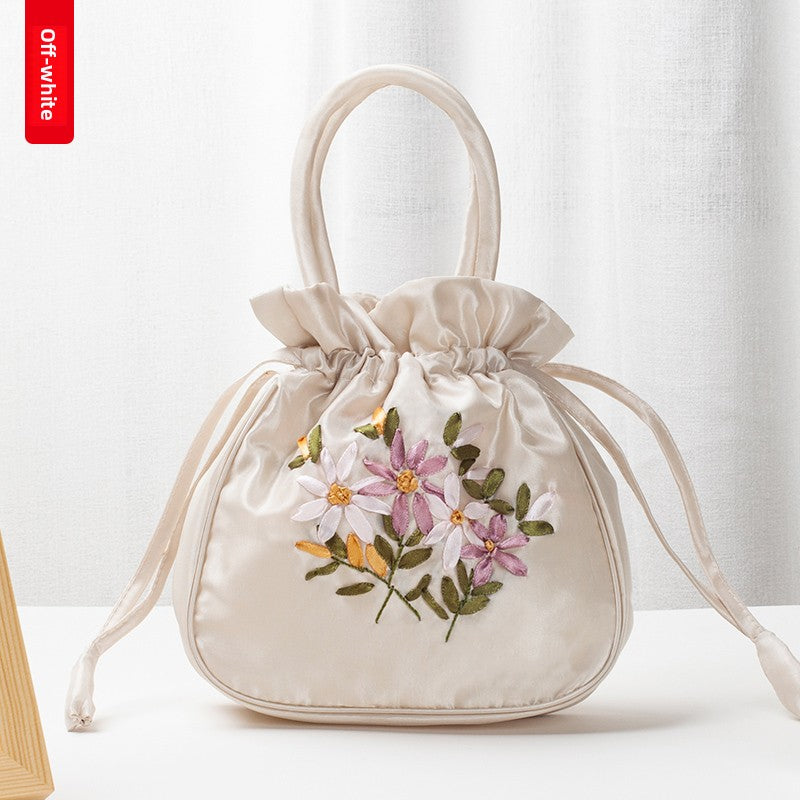 Hand-Embroidered Drawstring Bucket Bag