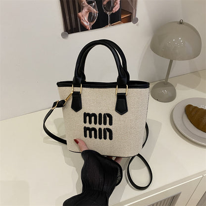 Large-capacity hand-held bucket bag