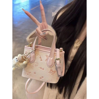 Pink Bucket Crossbody Bag with Pendant