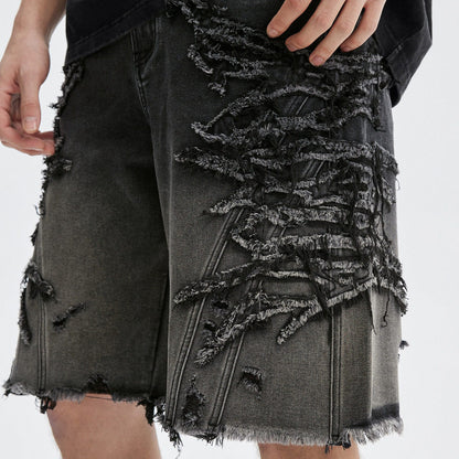 Distressed denim shorts