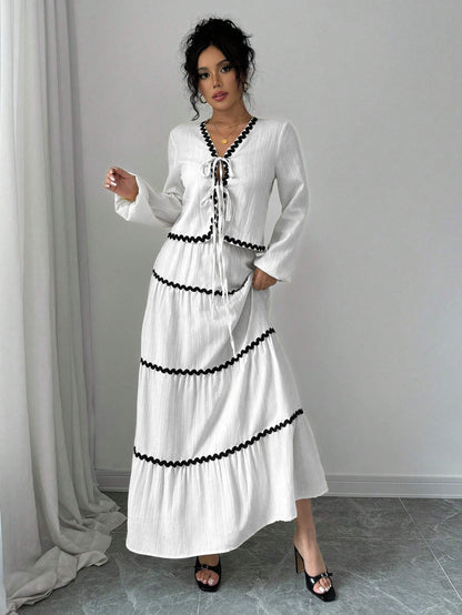 Loose-fitting dress with long sleeves