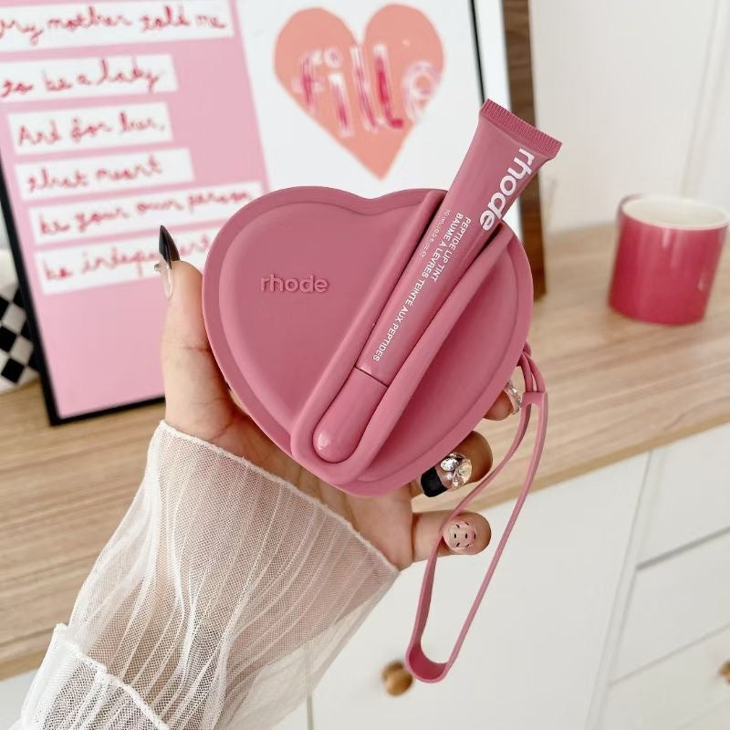 Portable coin purse with earphone compartment