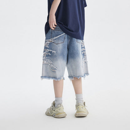 Distressed denim shorts