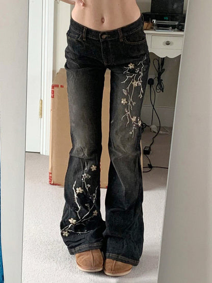 Distressed washed jeans