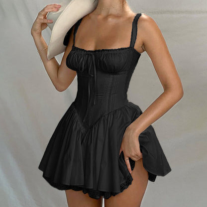 Lace-trimmed slip dress with a cinched waist and open back