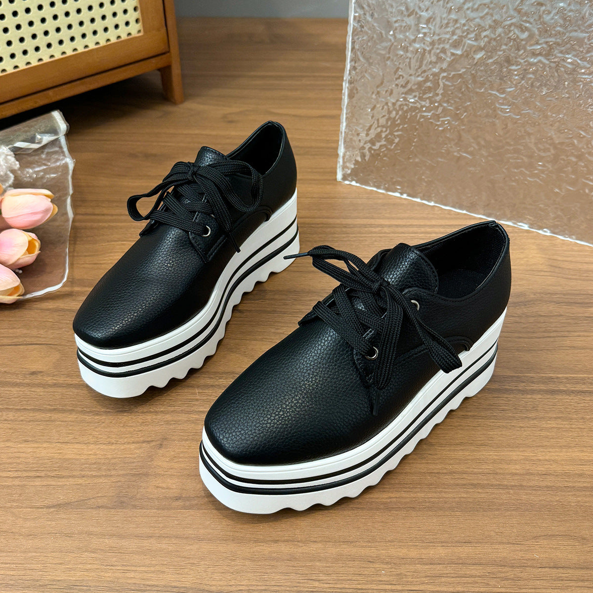 Striped loafers with lace-up straps