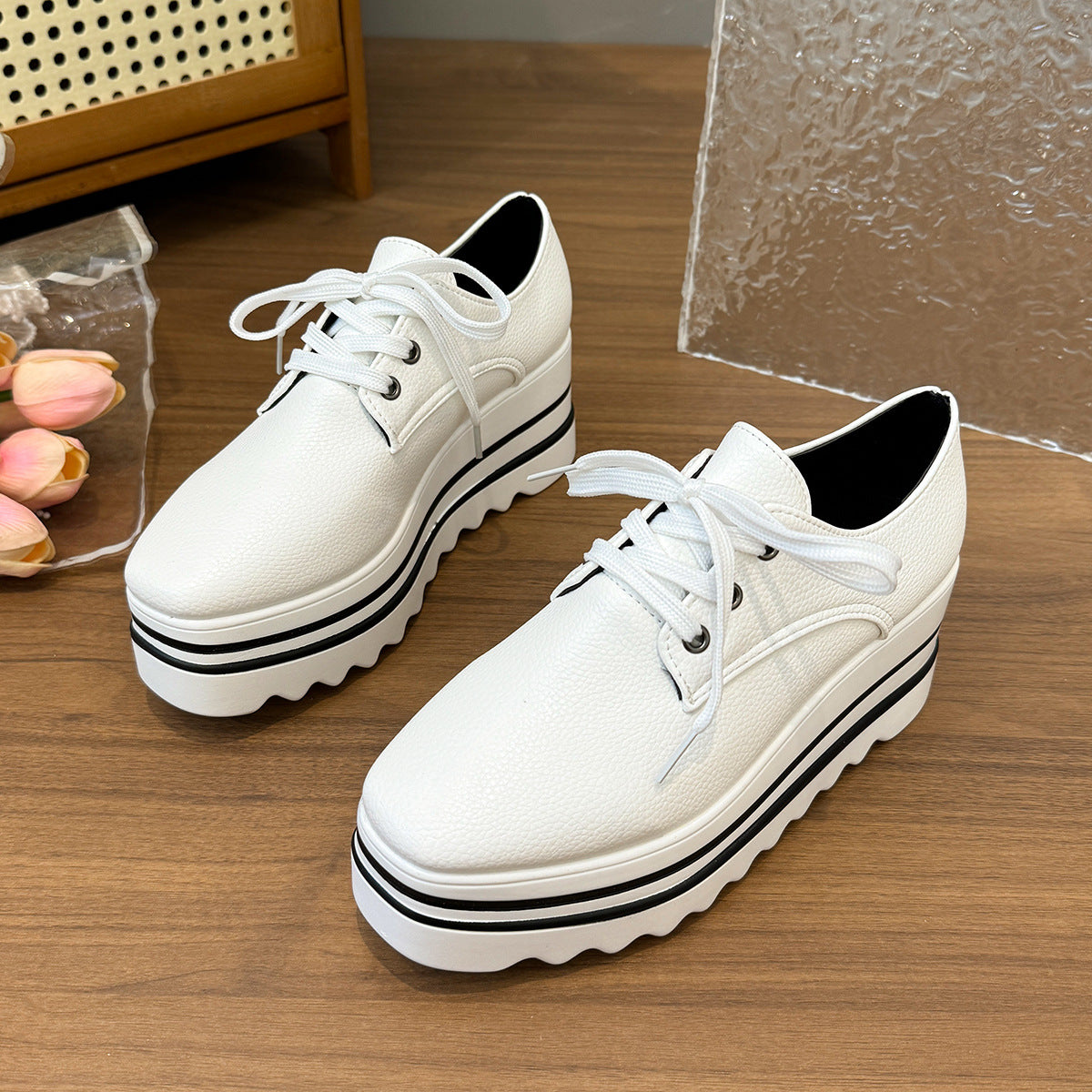 Striped loafers with lace-up straps
