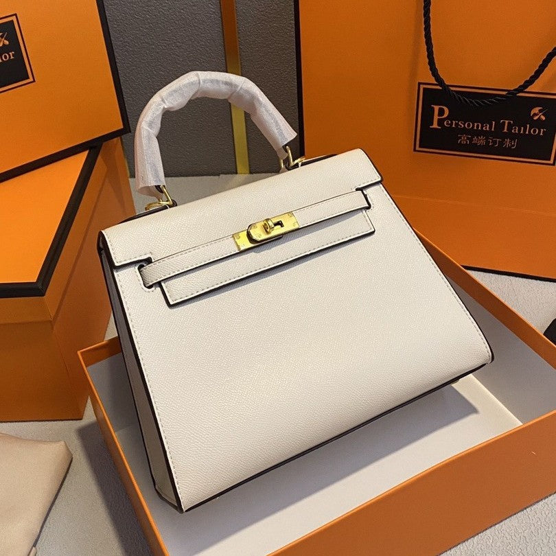 A fashionable women's handbag with a one-shoulder crossbody strap