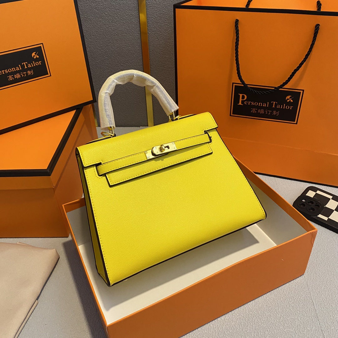 A fashionable women's handbag with a one-shoulder crossbody strap