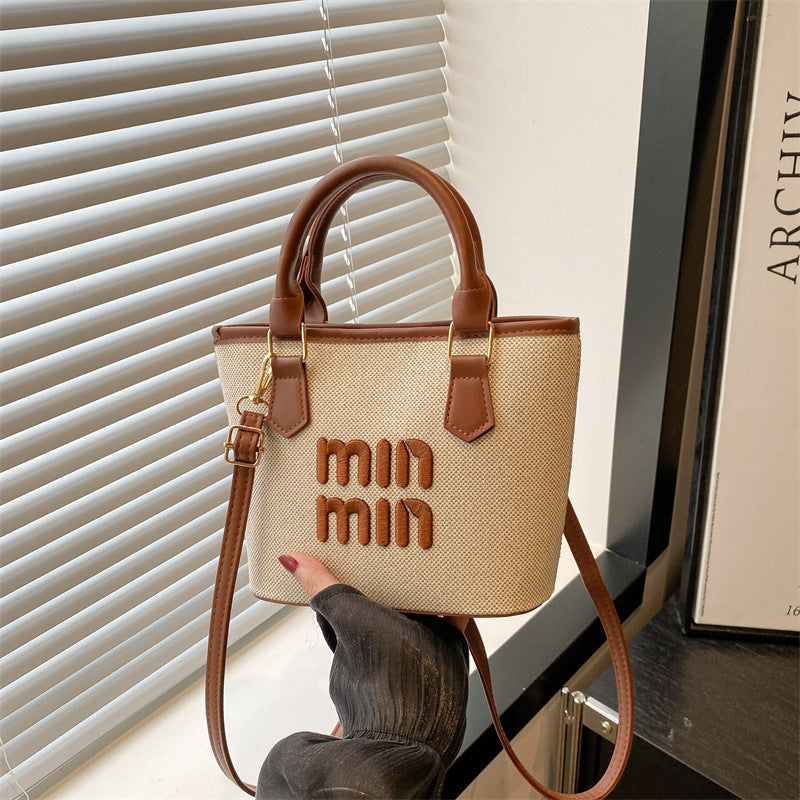 Large-capacity hand-held bucket bag