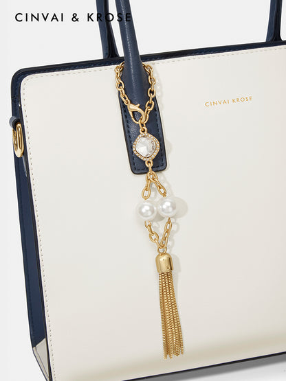 Hand-held shoulder-sling bag