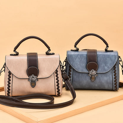 The lady is carrying a crossbody bag.