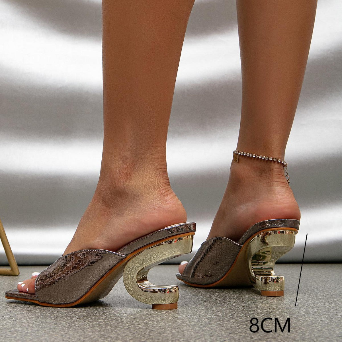 Lady's high-heeled sandals