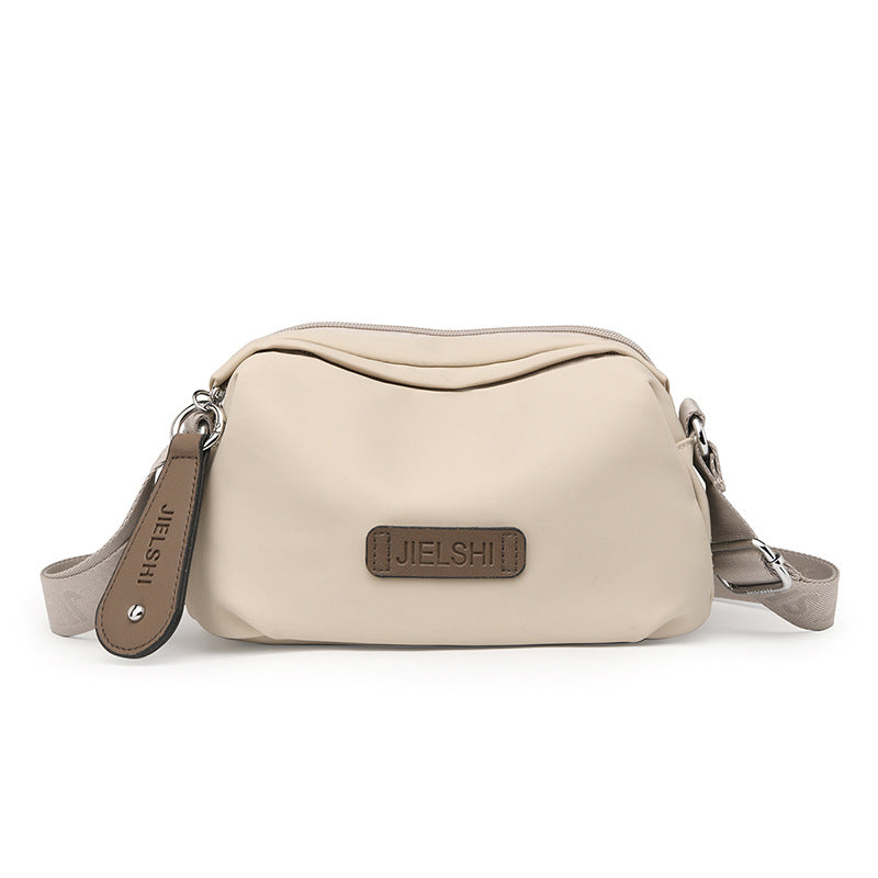Solid-color Oxford fabric crossbody bag