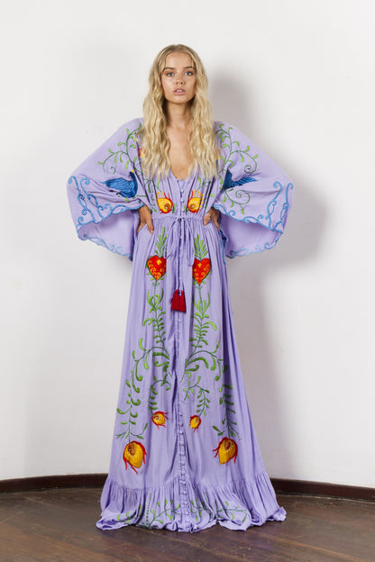Retro long dress with openwork tassel decoration
