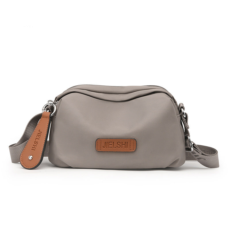 Solid-color Oxford fabric crossbody bag