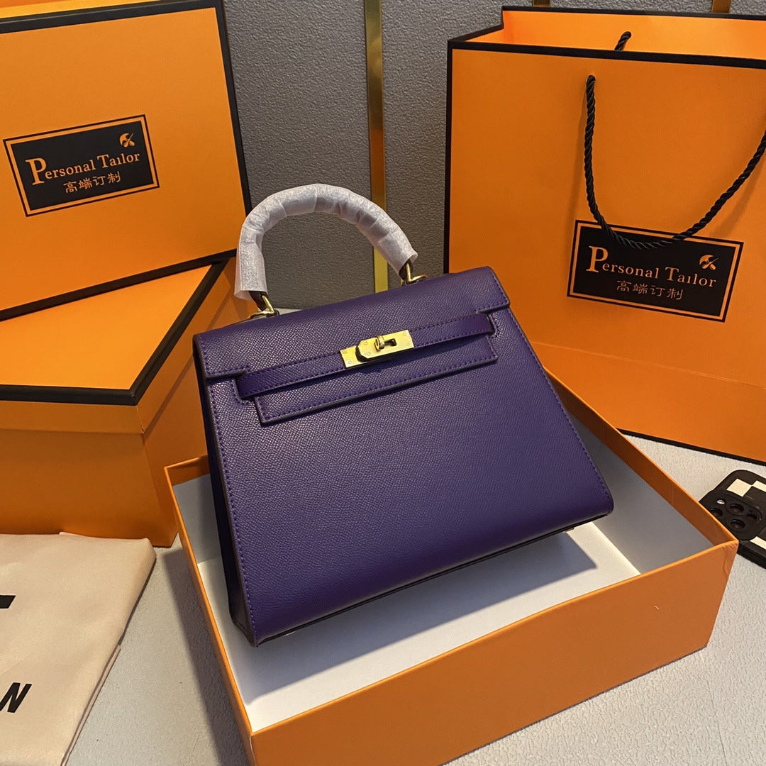 A fashionable women's handbag with a one-shoulder crossbody strap