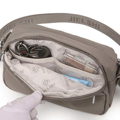 Solid-color Oxford fabric crossbody bag