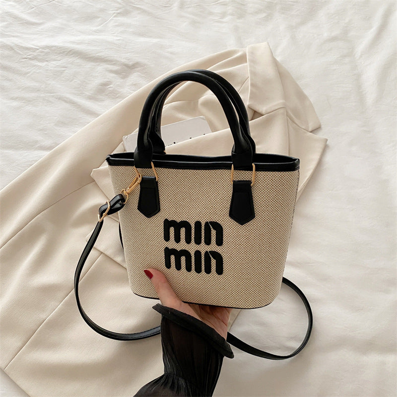 Large-capacity hand-held bucket bag