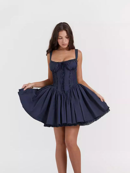 Lace-trimmed slip dress with a cinched waist and open back