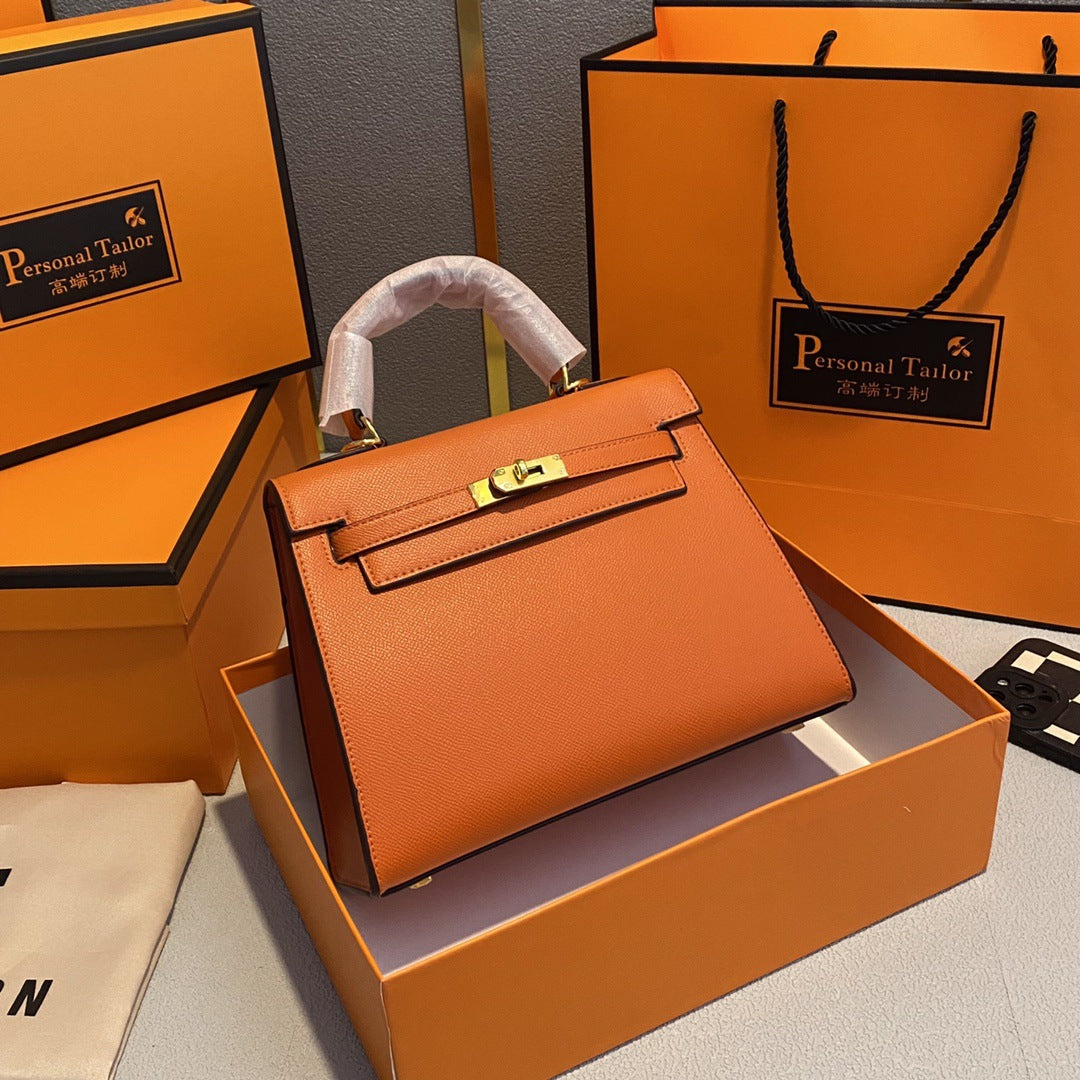 A fashionable women's handbag with a one-shoulder crossbody strap