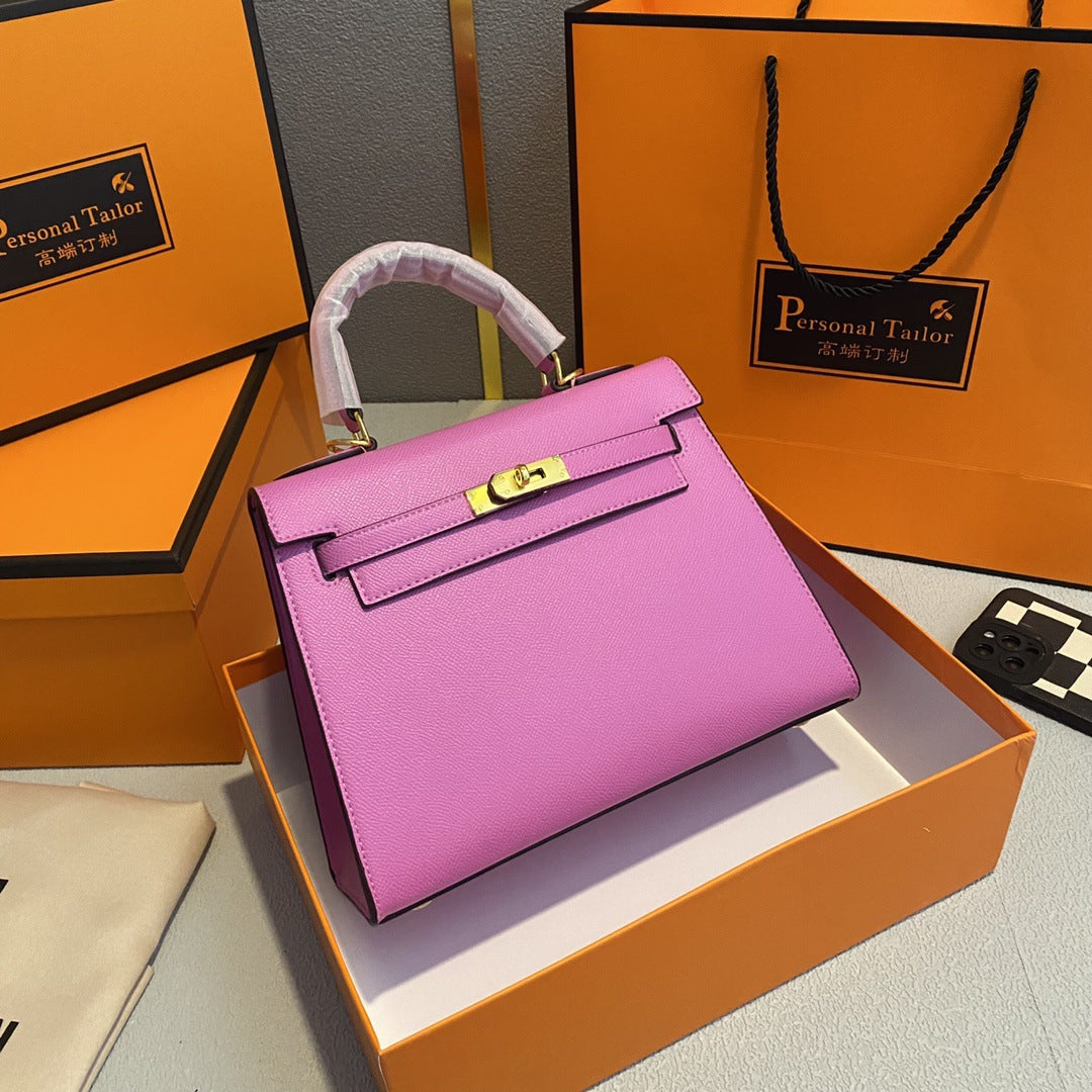 A fashionable women's handbag with a one-shoulder crossbody strap