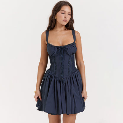 Lace-trimmed slip dress with a cinched waist and open back