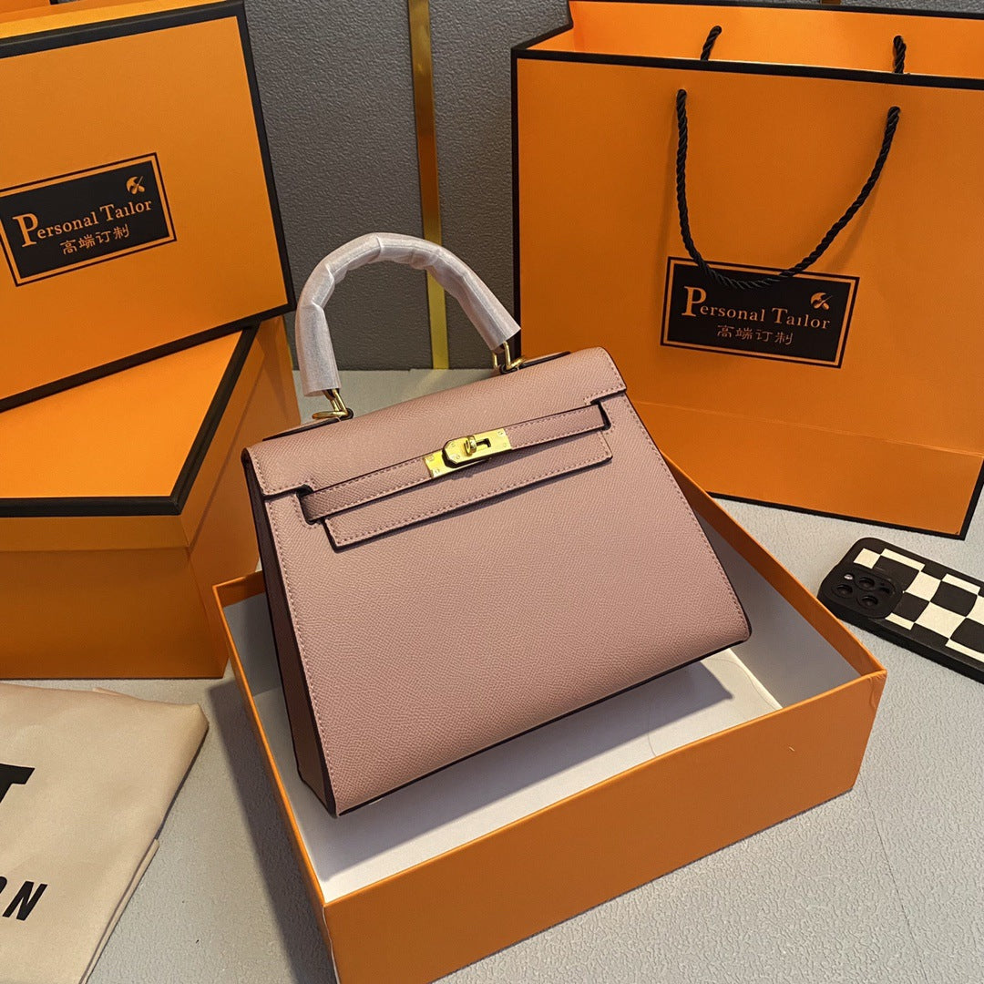 A fashionable women's handbag with a one-shoulder crossbody strap