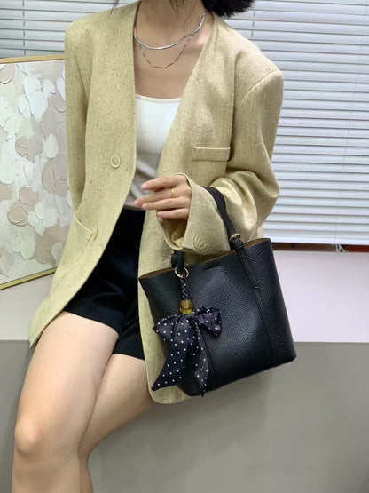 Versatile soft leather bucket bag