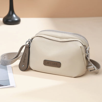Solid-color Oxford fabric crossbody bag