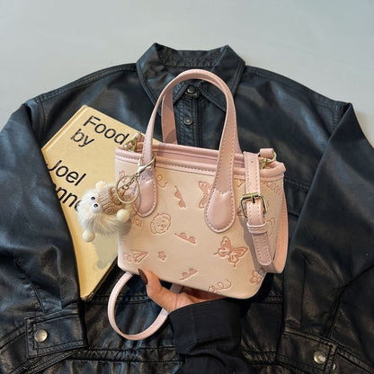 Pink Bucket Crossbody Bag with Pendant