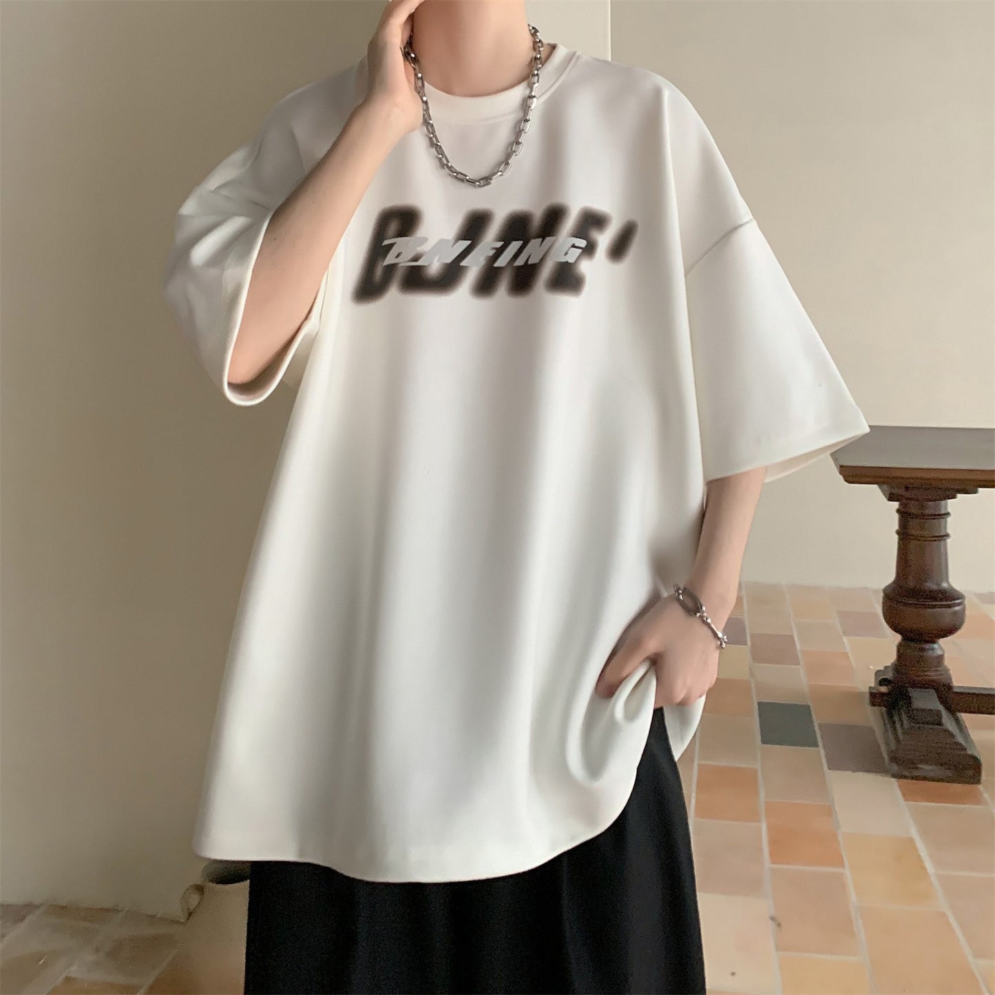 Half sleeve loose short sleeved shirt