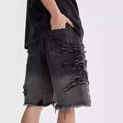 Distressed denim shorts