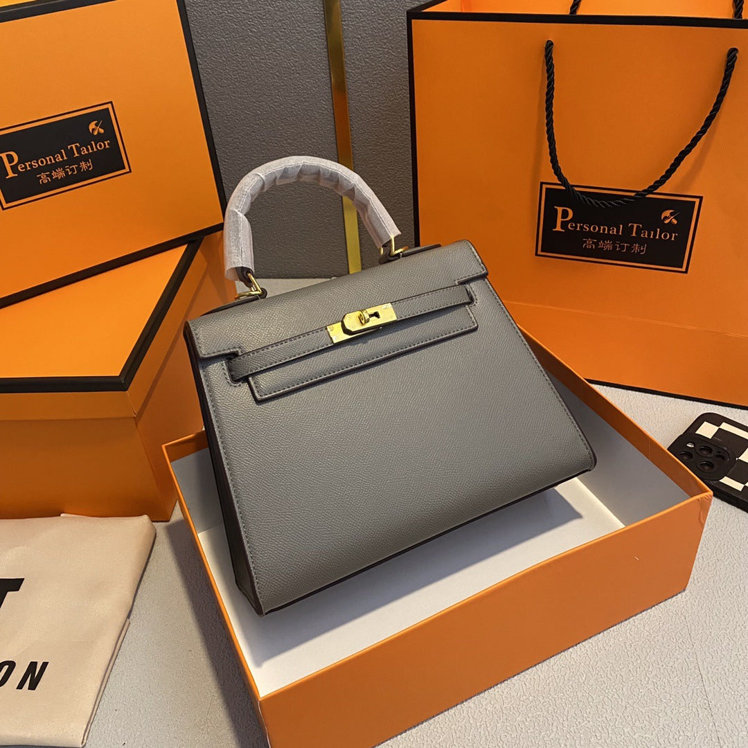 A fashionable women's handbag with a one-shoulder crossbody strap