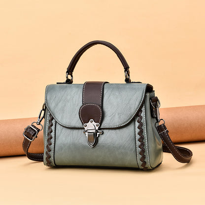 The lady is carrying a crossbody bag.