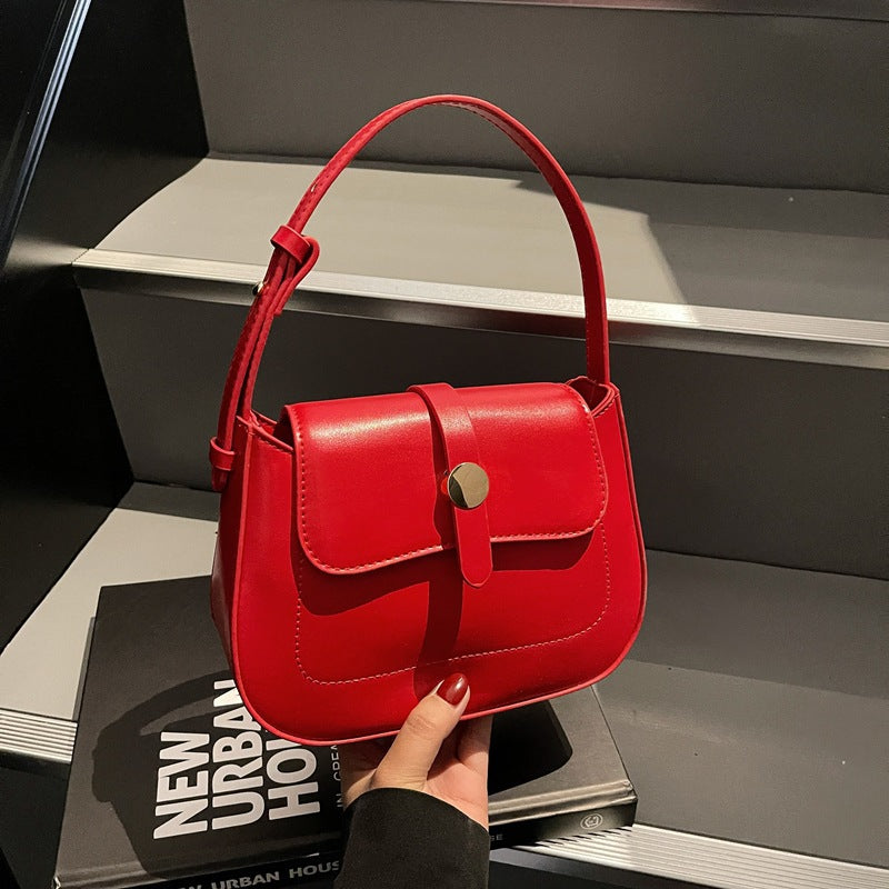 A versatile small square bag