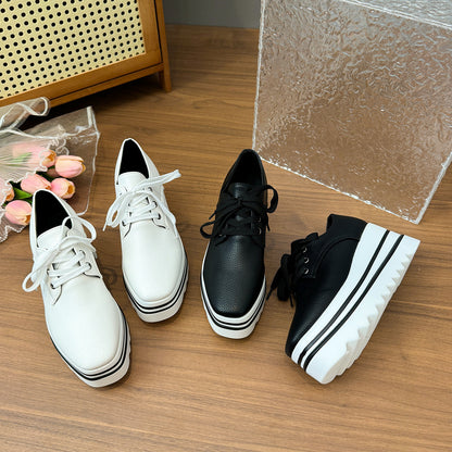 Striped loafers with lace-up straps