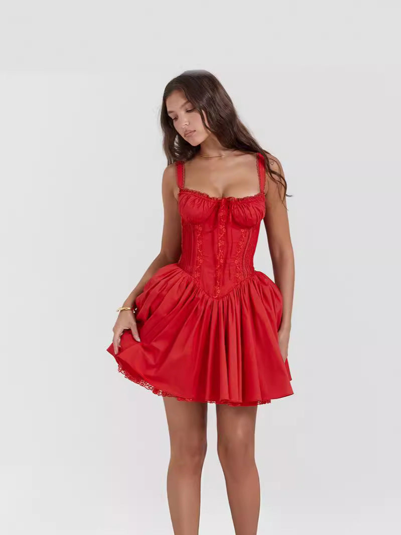 Lace-trimmed slip dress with a cinched waist and open back