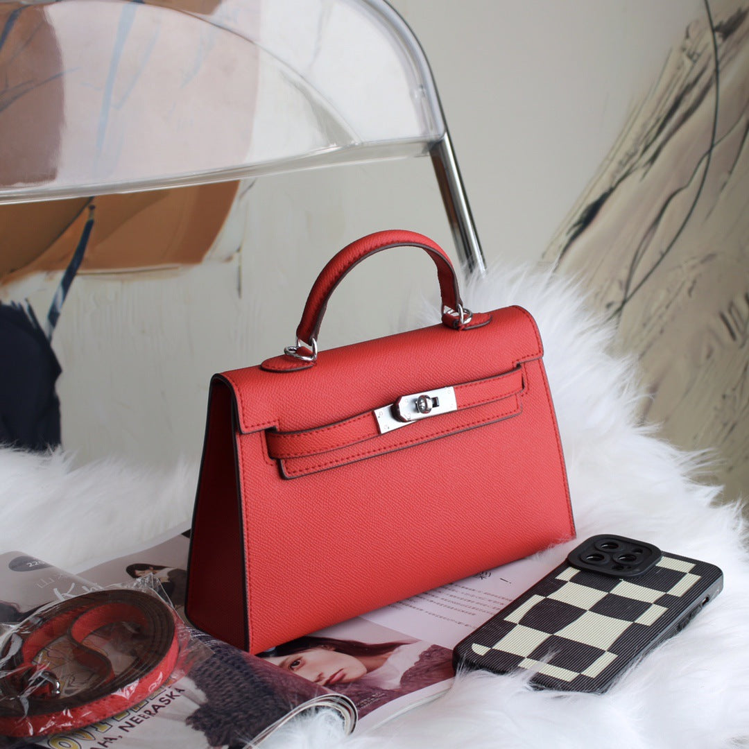 A fashionable women's handbag with a one-shoulder crossbody strap