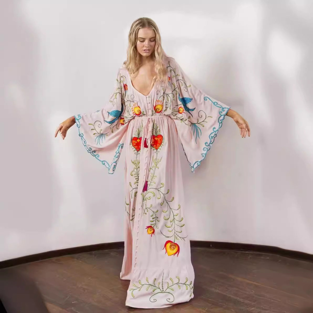 Retro long dress with openwork tassel decoration