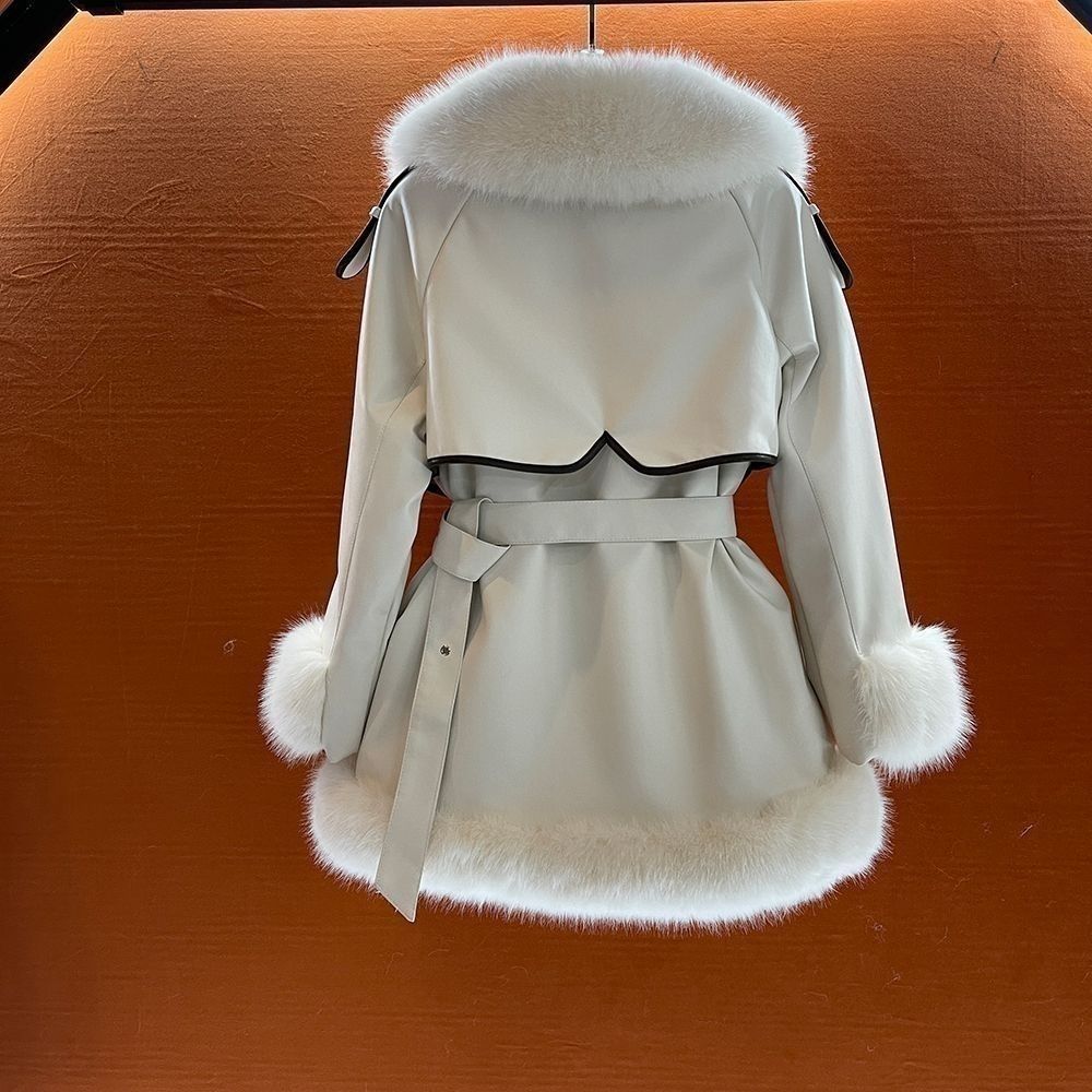 Women's mid-length fur coat with large fur collar and tie