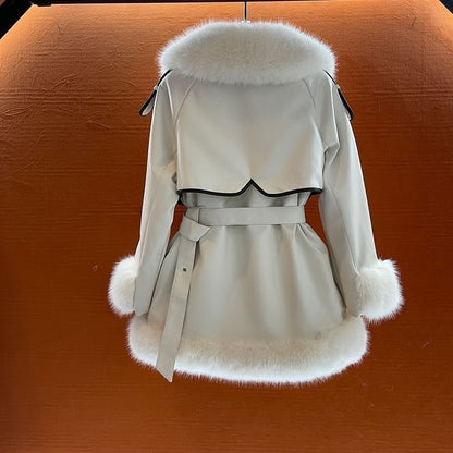 Women's mid-length fur coat with large fur collar and tie